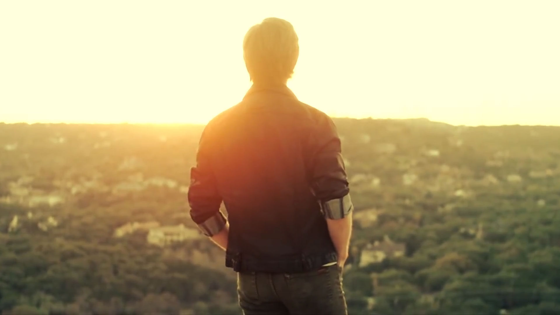 How to win 48-hour film contests - man watching sunset overlooking the city