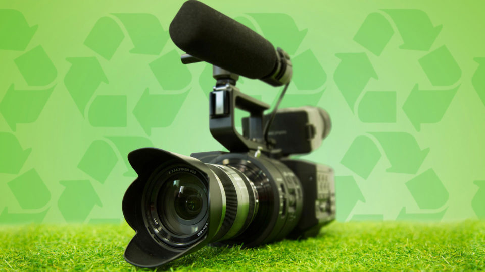 Eco-friendly filmmaking - video camera with eco-background