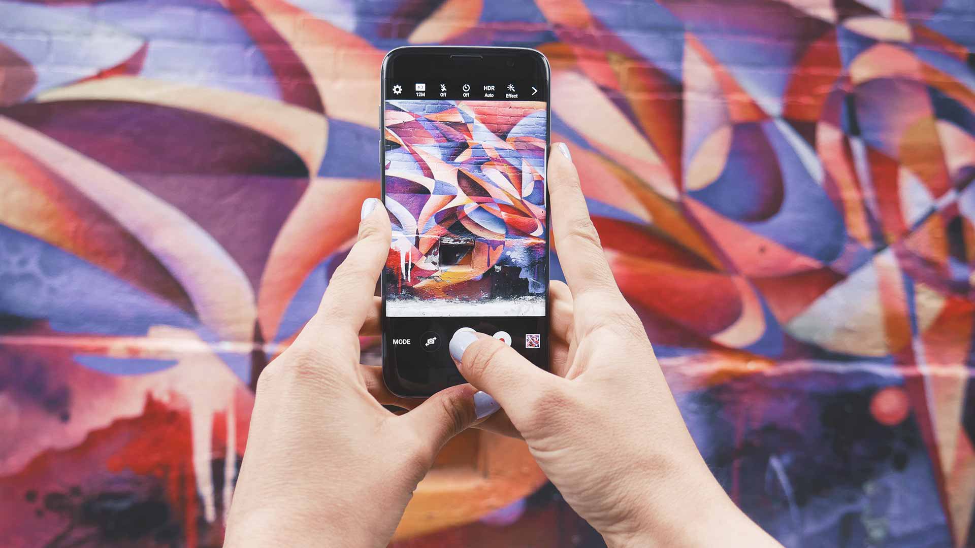 Smartphone shooting video of stylised graffiti - Short film ideas for iPhone filmmakers