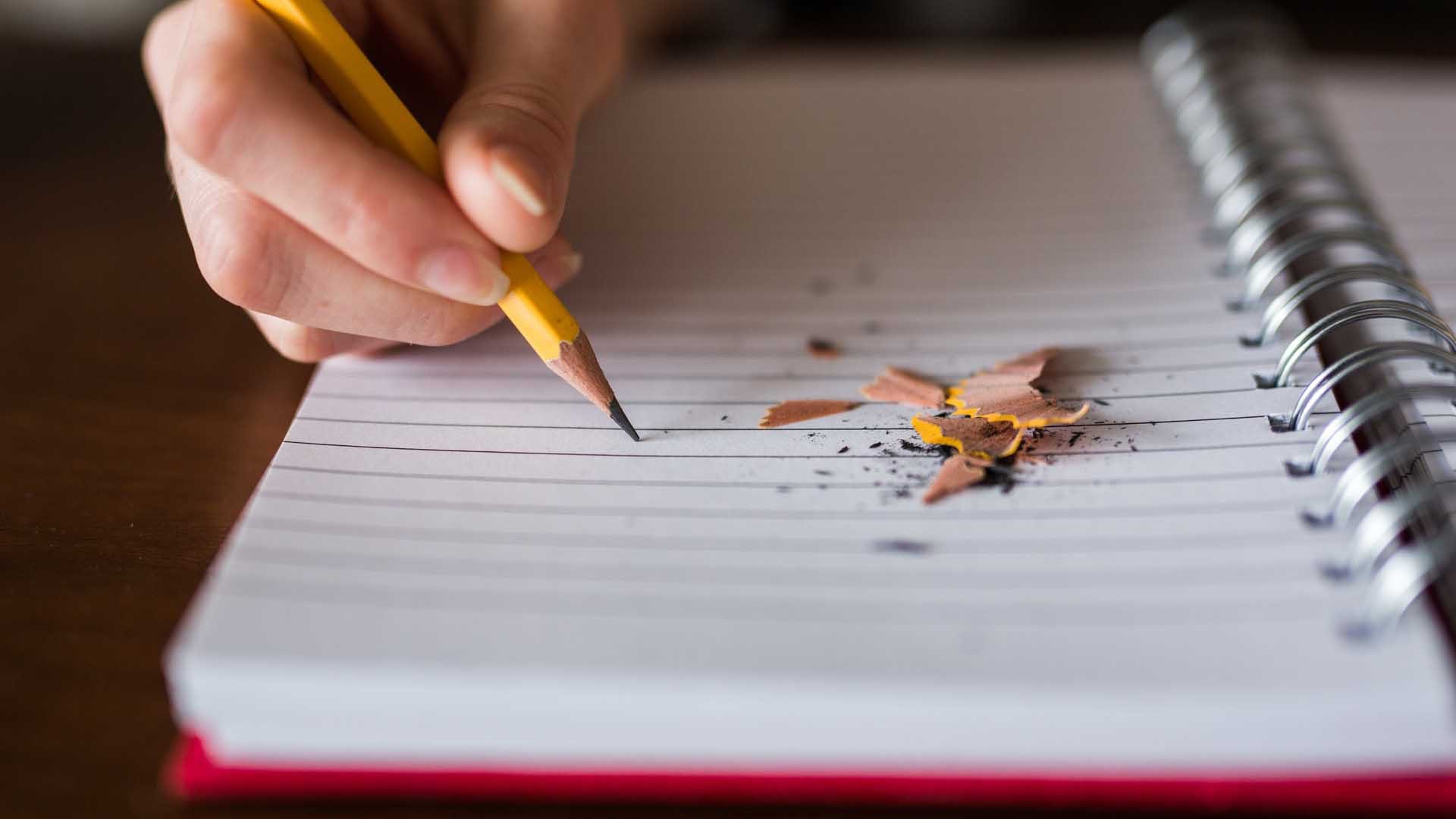 Scriptwriting/screenwriting - notebook with pencil and pencil shavings
