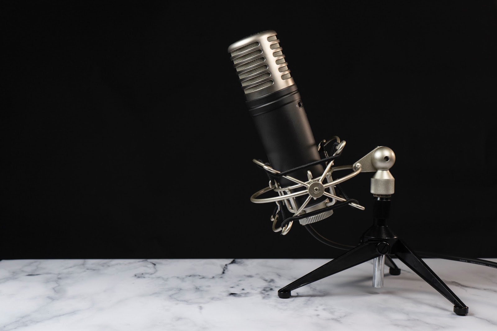 Podcast and voice-over microphone in cradle