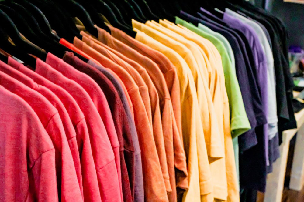 A rack of colourful tshirts