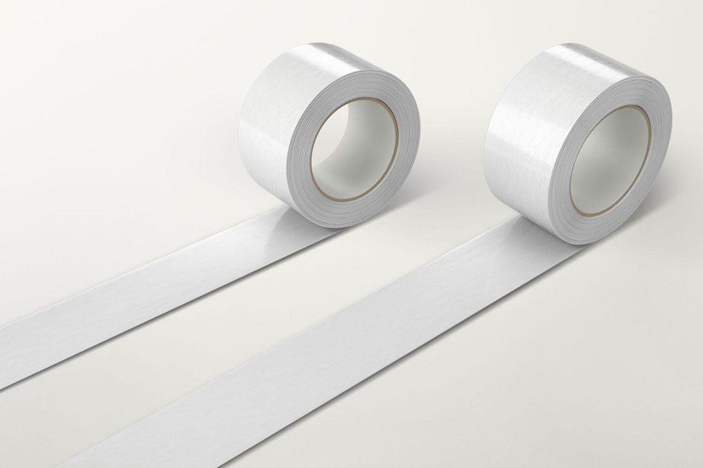 Rolls of white duct tape on surface